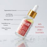 A bottle of Kumkumadi Elixir Oil by Ayurvedam - with its benefits written on the banner