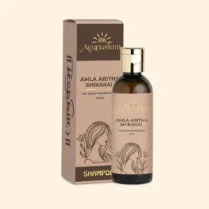 A bottle of Amla, Aritha & Shikakai Shampoo by Ayurvedam 100ml